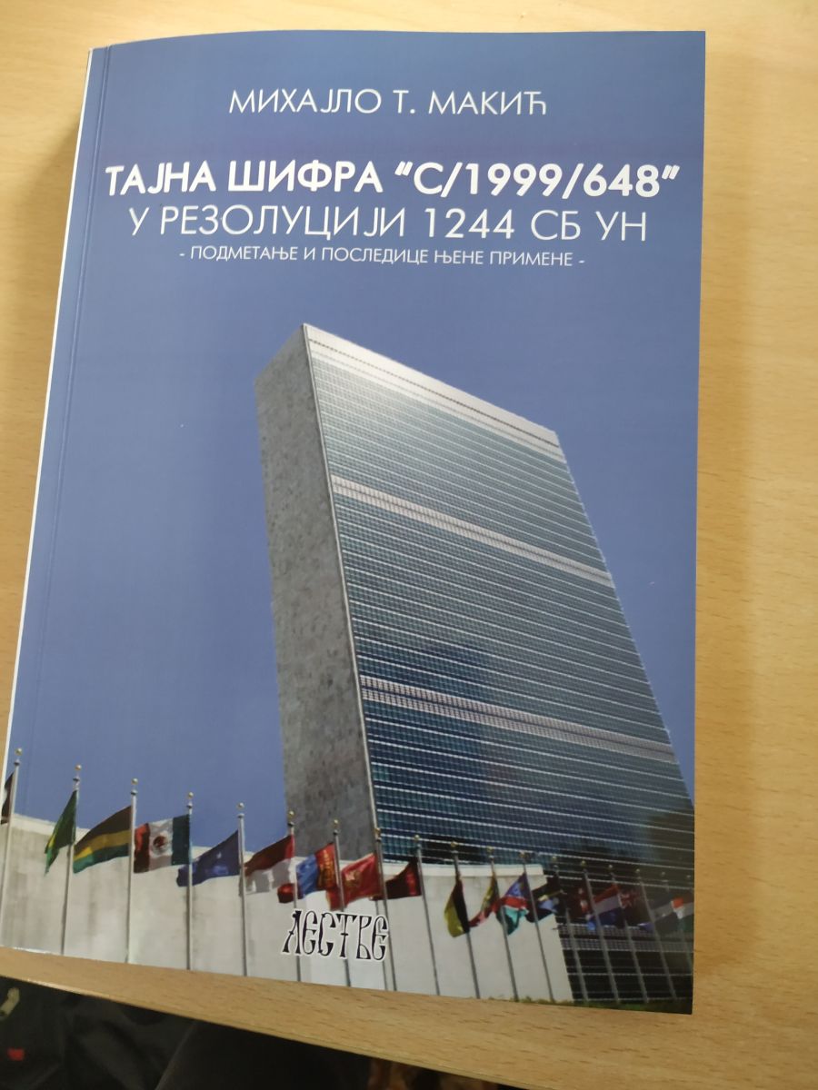 sudija-mihajlo-t.-makic-poklanja-knjigu-„tajna-sifra-s/1999/648-”-srpskom-rasejanju